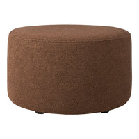 Round brown ottoman with textured fabric, versatile for modern decor.