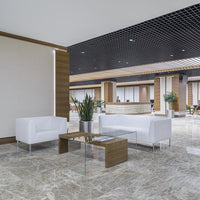 Modern lounge area with white sofas, wooden accents, and marble flooring, featuring sleek lines and neutral tones.