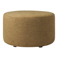 Round ottoman in a warm, textured tan fabric, featuring a simple, solid pattern and black feet for stability.