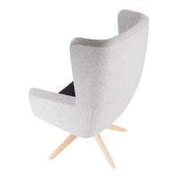 Light gray upholstered chair with clean lines and natural wood legs, featuring a minimalist design and cozy, contemporary look.