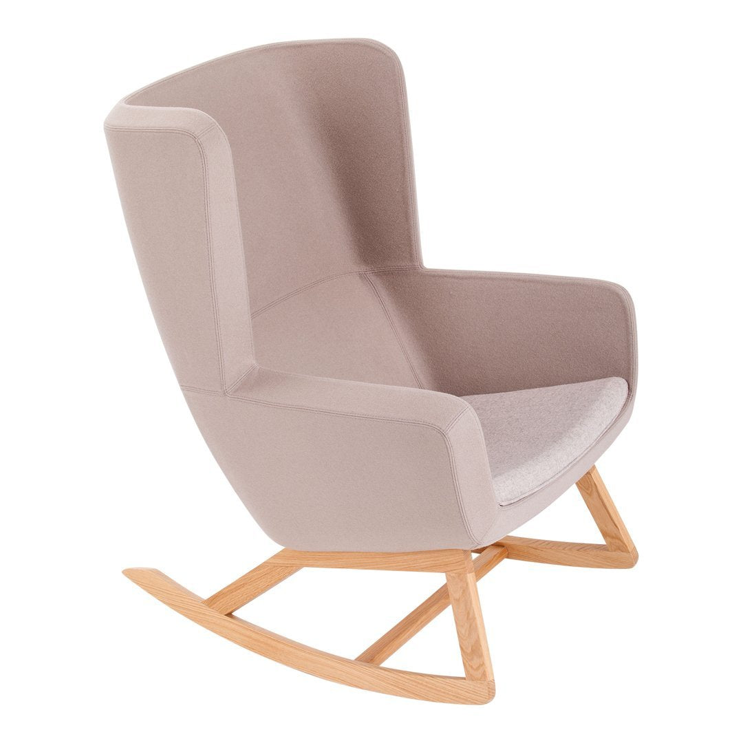 Soft beige rocking chair with a smooth, modern design and light wooden base. Perfect for any cozy space.