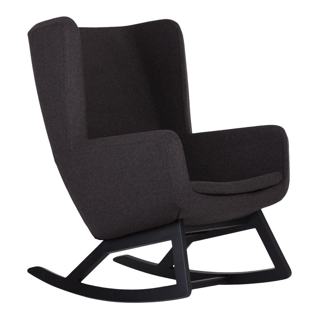 Modern black rocking chair with a sleek design and textured upholstery. Perfect for contemporary interiors.