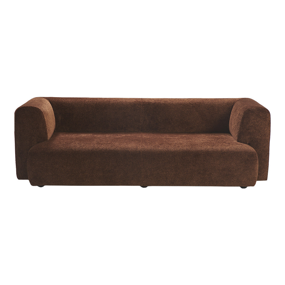 Brown upholstered sofa with a sleek, minimalist design and soft, textured fabric for a modern aesthetic.