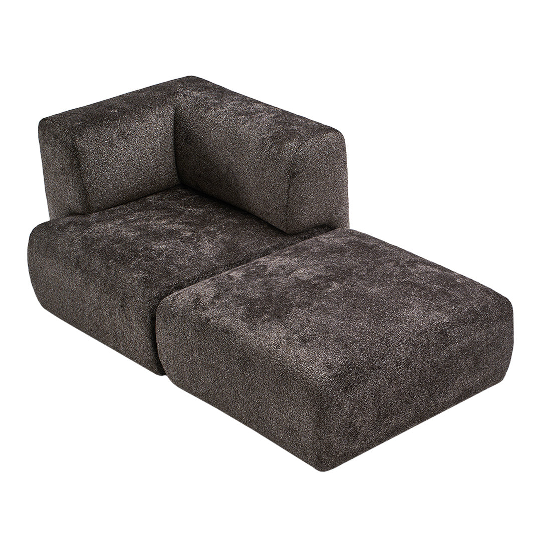 Soft gray, textured upholstery in a modern chaise lounge design with clean lines and minimalistic aesthetics.