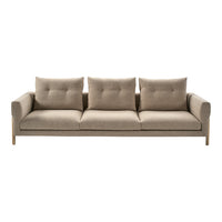 Modern beige sofa with a smooth texture and three plush cushions, perfect for contemporary living spaces.