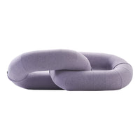 Purple interlinked cushion with a smooth, rounded design, featuring a soft fabric texture and subtle color variations.