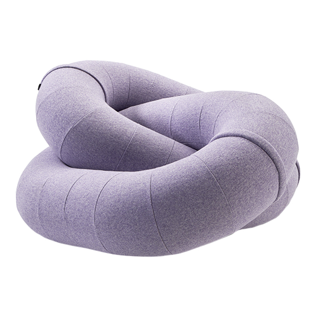 Twisted knot pillow in soft lavender fabric, featuring smooth lines and a modern design. Perfect for stylish comfort.