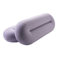 Soft lavender cylindrical cushions with a smooth texture and minimalist design, perfect for modern decor.