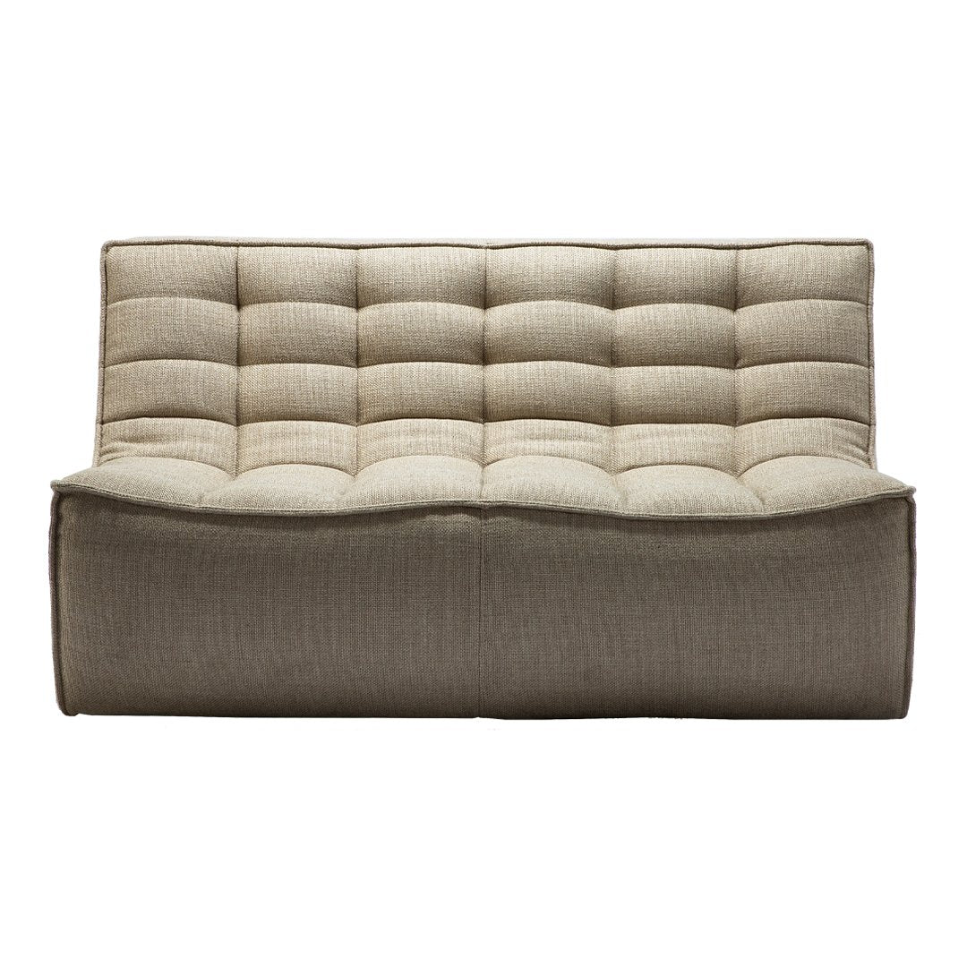 Beige tufted sofa with a textured pattern and a clean, minimalistic design, ideal for modern interiors.