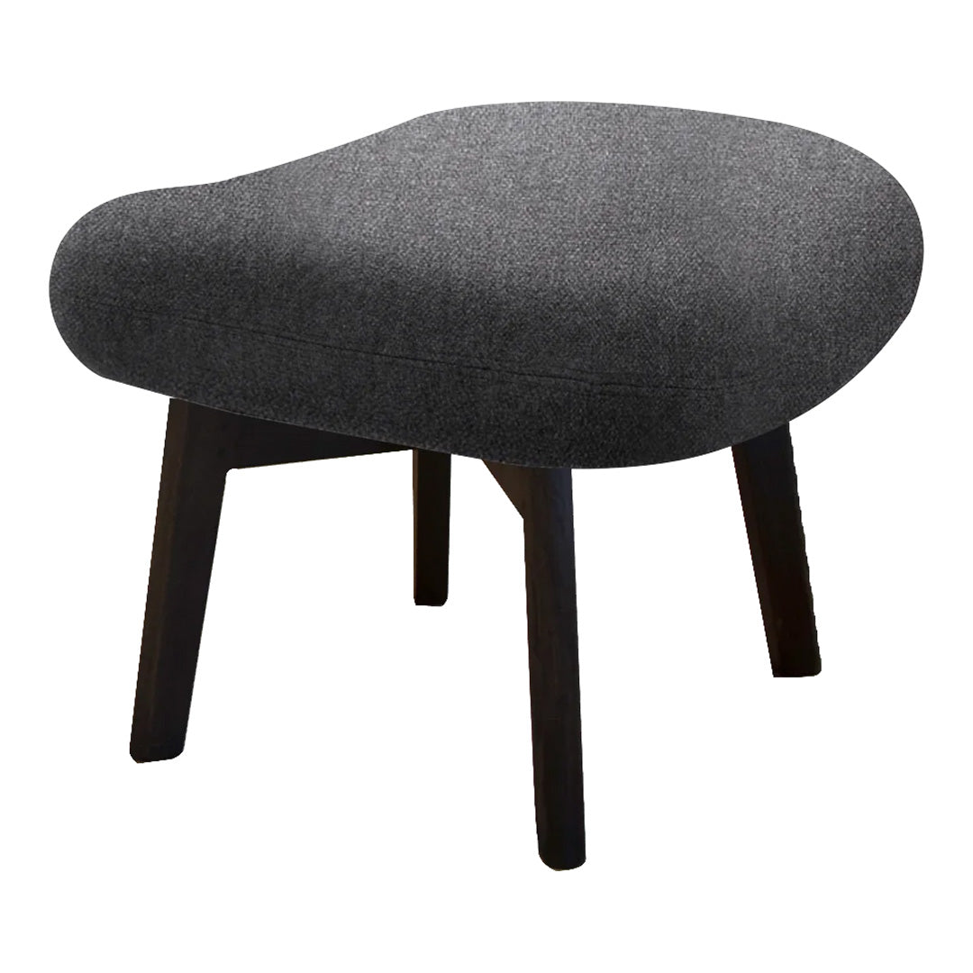 Gray upholstered ottoman with a rounded shape and dark wooden legs, perfect for modern decor.