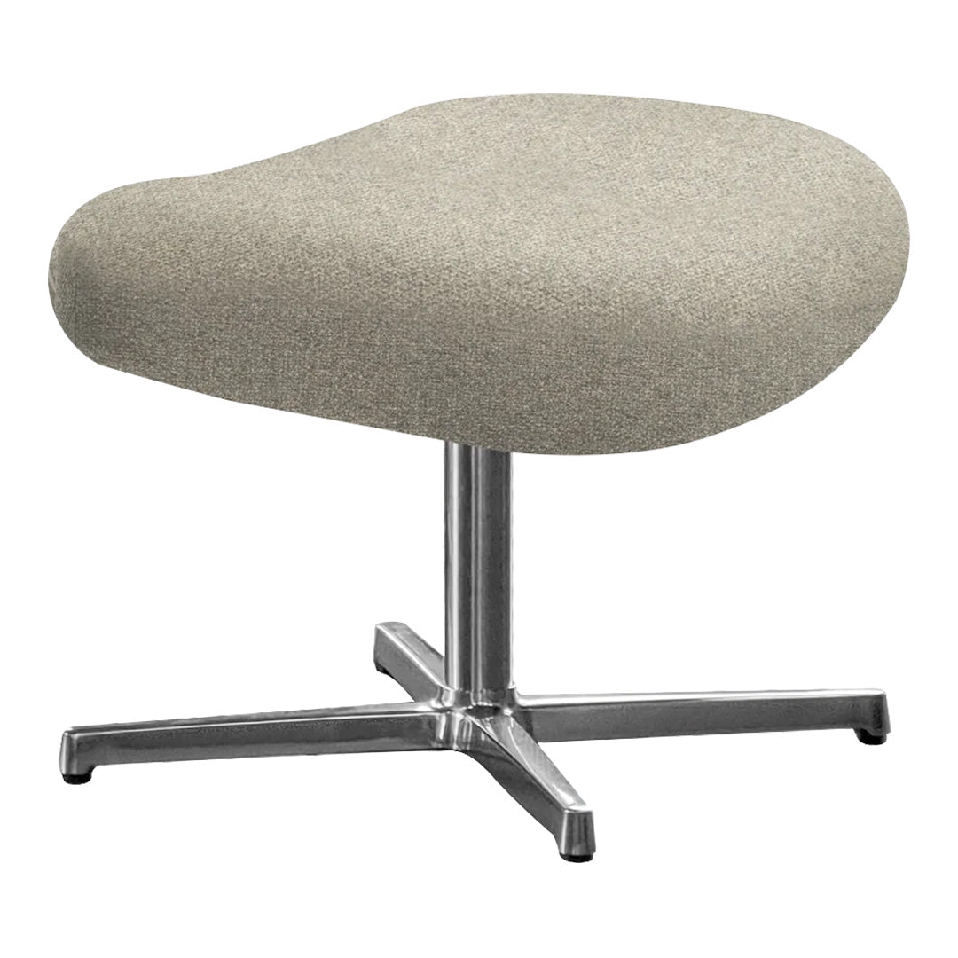 Beige upholstered ottoman with a smooth, rounded shape and a sleek chrome base. Modern design for stylish interiors.