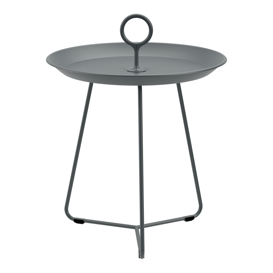 Gray round tray table with a minimalist design and a circular handle on top, supported by three sleek legs.