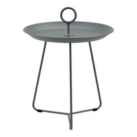 Gray round tray table with a minimalist design and a circular handle on top, supported by three sleek legs.
