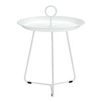 White round tray table with a minimalistic design and sleek metal legs, featuring a circular handle.