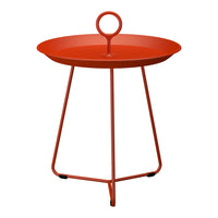 Bright orange round table with a handle and sleek metal legs, perfect for modern decor.