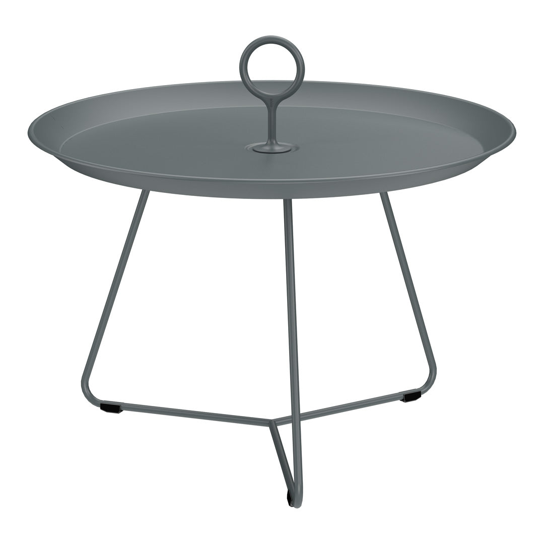 Gray metal round table with a minimalist design and a loop handle, featuring sleek, modern lines.