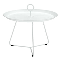 White metal round tray table with a simple design and minimalist style, featuring a central handle and slender legs.
