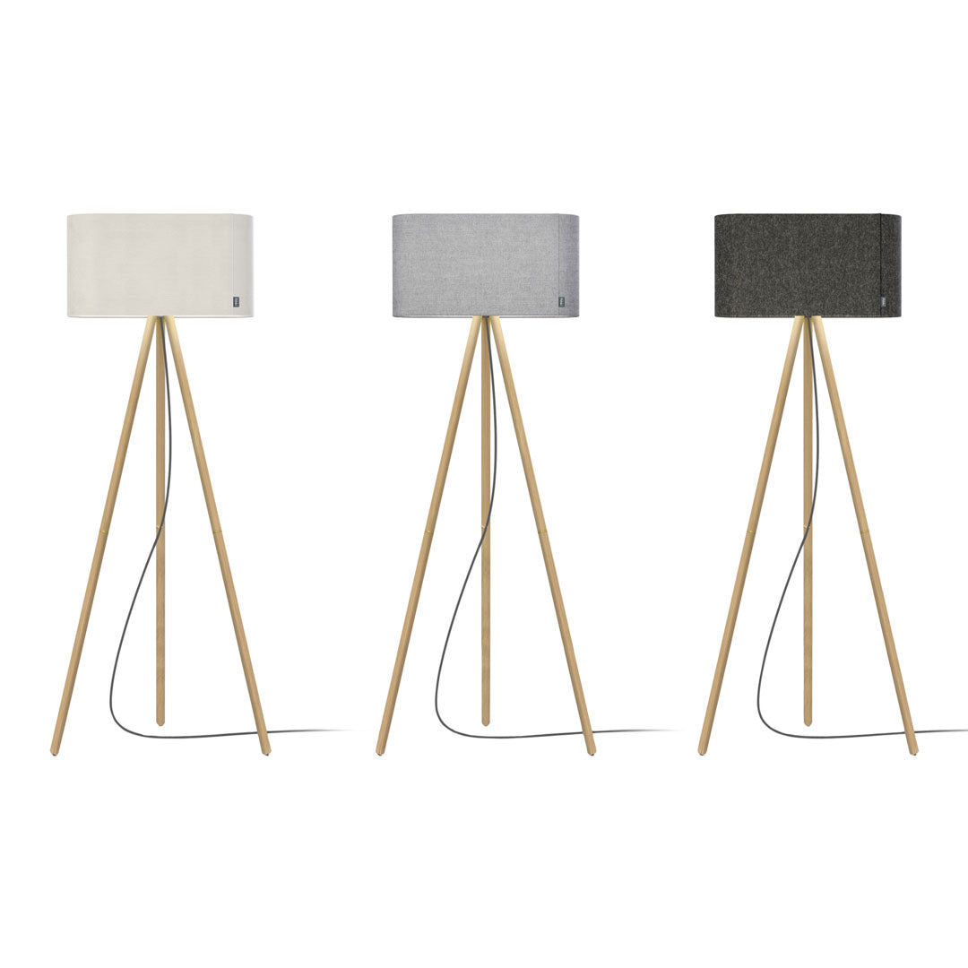 Three modern floor lamps with beige, light gray, and dark gray shades on wooden tripods, featuring simple designs.