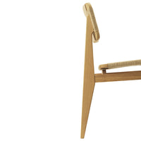 Light wood chair with a natural finish, featuring a woven seat and minimalist design.
