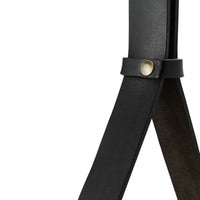Black leather straps with a smooth texture and a subtle gold button accent. Minimalist design ideal for modern decor.
