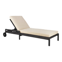 Cream-colored cushion on a sleek black metal frame, minimalistic design, perfect for outdoor relaxation.