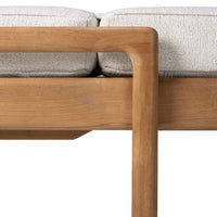 Natural wood tones with a textured soft gray cushion, featuring clean lines and minimalist design.