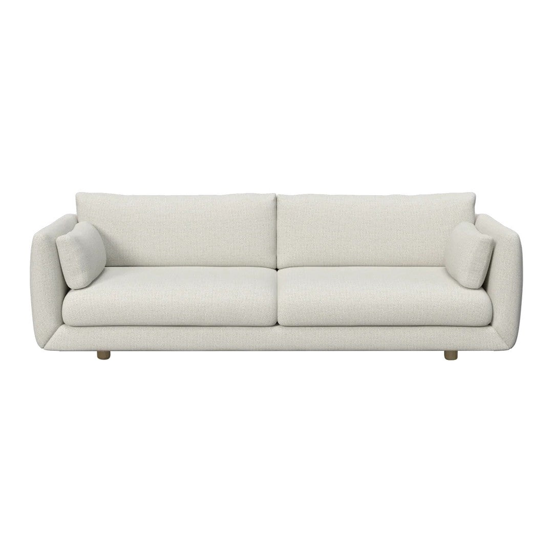 Stylish cream sofa with smooth upholstery and simple, modern design, featuring two soft matching cushions.