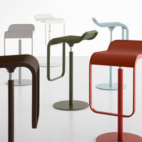 Colorful modern bar stools in hues of brown, green, blue, red, and gray with sleek, contemporary designs and smooth finishes.