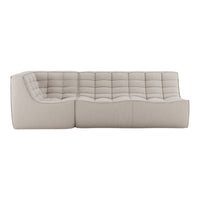 Beige tufted sofa in a contemporary design, featuring a smooth, textured fabric with a minimalist aesthetic.
