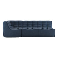 Deep navy blue sectional sofa with tufted pattern and smooth upholstery for a modern look.