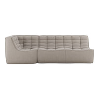 Contemporary beige sectional sofa with a quilted pattern and smooth fabric texture for stylish living spaces.