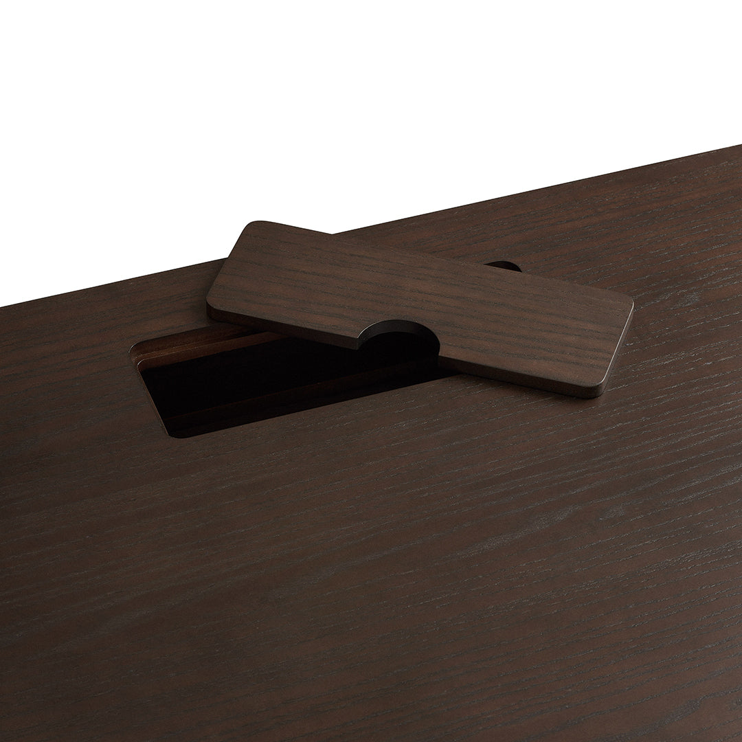 Dark wood table surface with a smooth, rich brown finish and subtle grain pattern, featuring a contrasting lighter inlay.