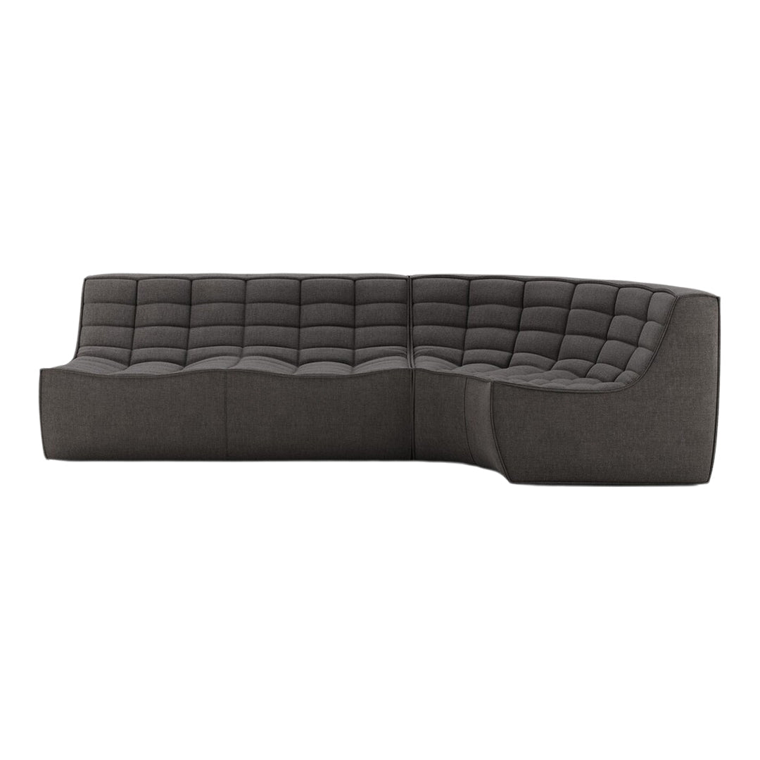 "Modern dark gray upholstered sectional sofa with tufted pattern for a sleek, contemporary look."