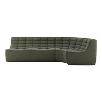 Modern green sectional sofa with tufted pattern, featuring a sleek design and soft fabric texture.