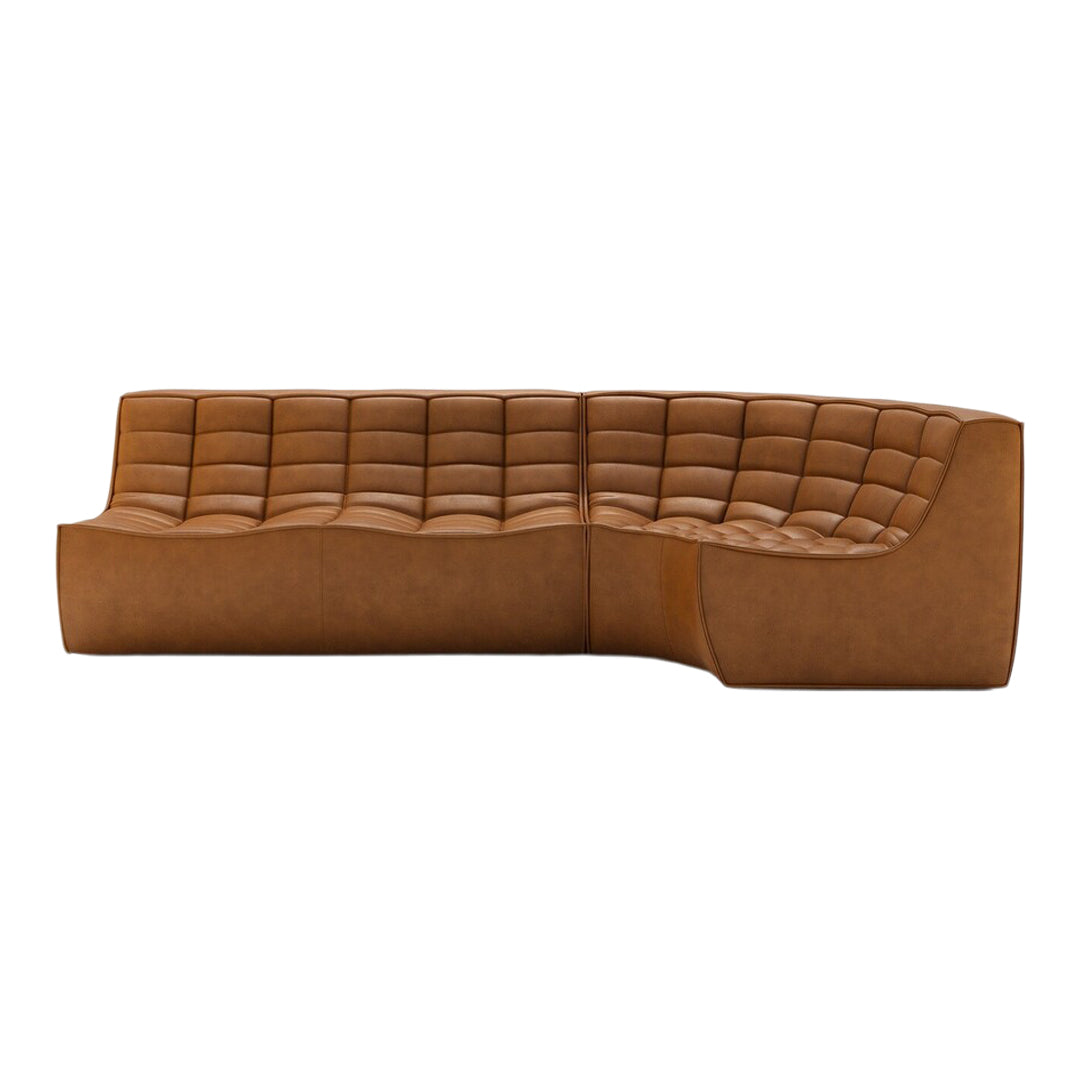 Brown tufted leather sectional sofa with a curved design and smooth, sleek lines. Ideal for modern interiors.