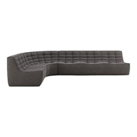 Gray upholstered sectional sofa with tufted pattern and sleek curved design, perfect for modern living spaces.