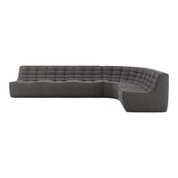 Modern gray sectional sofa with a tufted patterned design, showcasing sleek lines and plush texture for stylish comfort.
