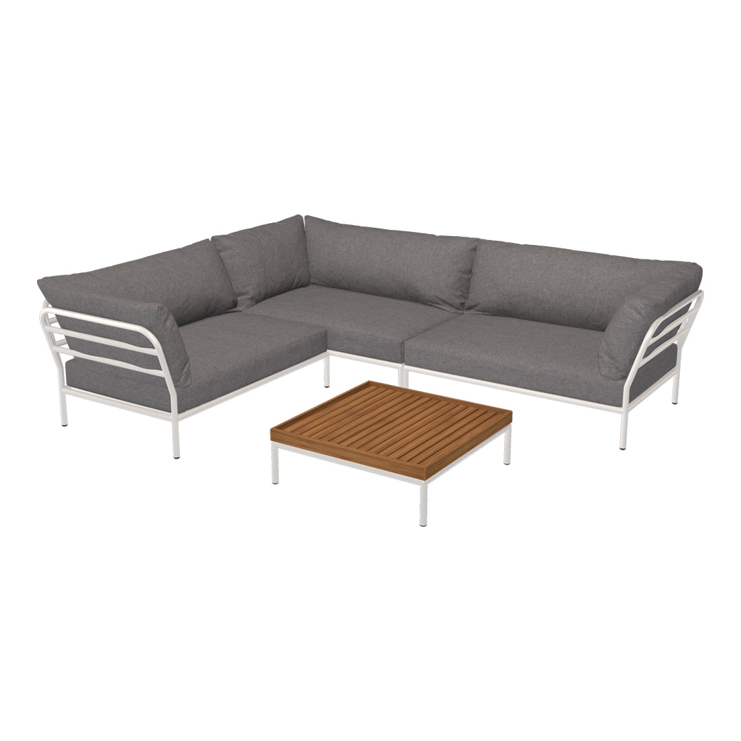 Gray sectional sofa with white frame and wood slat coffee table, perfect for modern outdoor spaces.