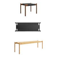 Modern furniture set featuring warm wood tones and a sleek black tabletop for a stylish contrast.