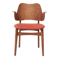 Wooden chair with a warm brown finish and a soft coral-orange upholstered seat. Smooth, organic shapes.