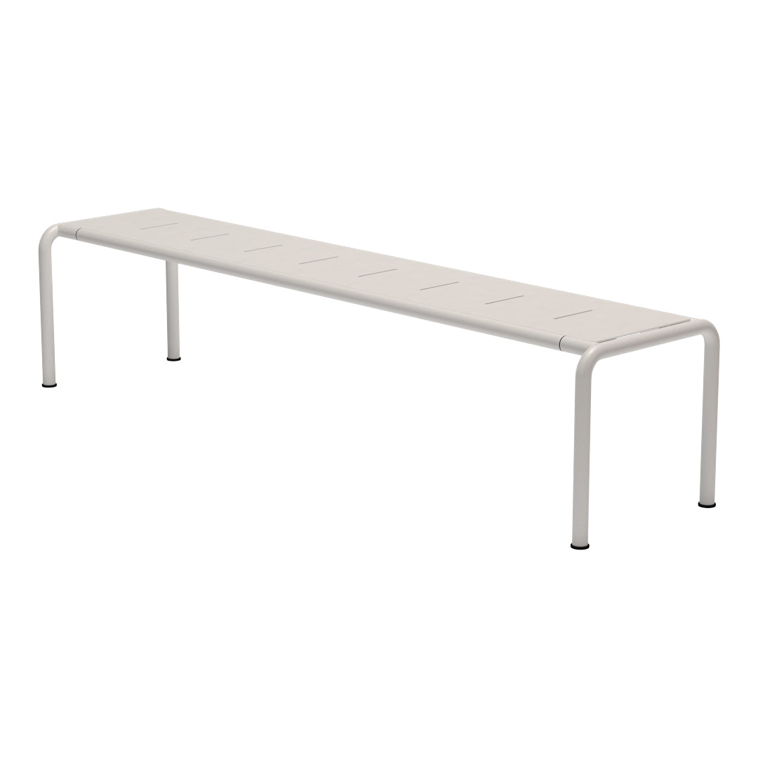 White metal outdoor bench with a sleek, minimal design and horizontal slatted pattern.