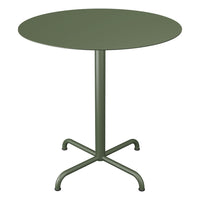 Round green metal table with a smooth surface and minimalist design, featuring a sturdy four-legged base.