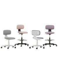 Set of four ergonomic office chairs in soft gray, pastel pink, and light purple hues with sleek white and black accents.