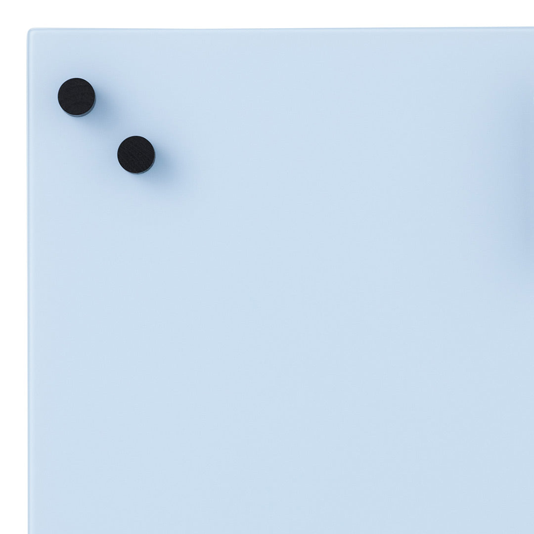 Light blue surface with two black circular accents, offering a stylish and modern design.