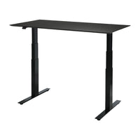 Black standing desk with a sleek, solid surface and sturdy metal legs, perfect for modern workspaces.