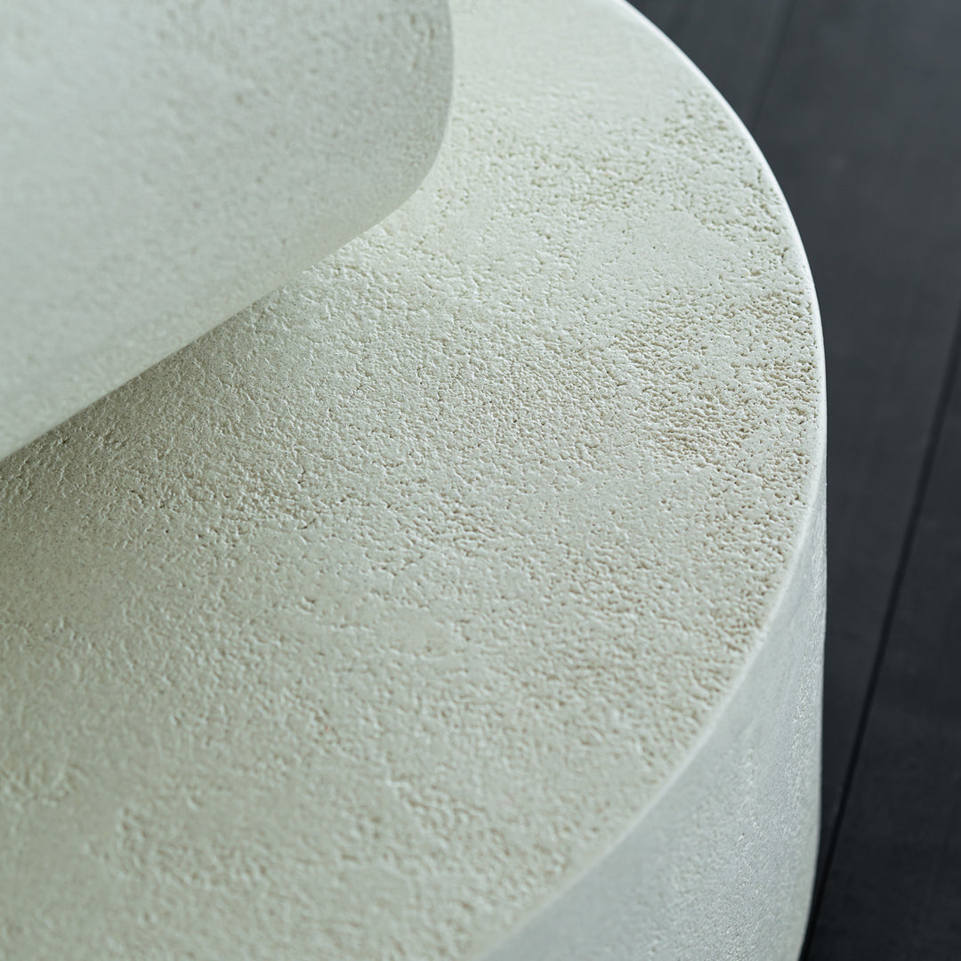 Light beige textured surface with subtle variations, set against a dark background. Perfect for modern decor.