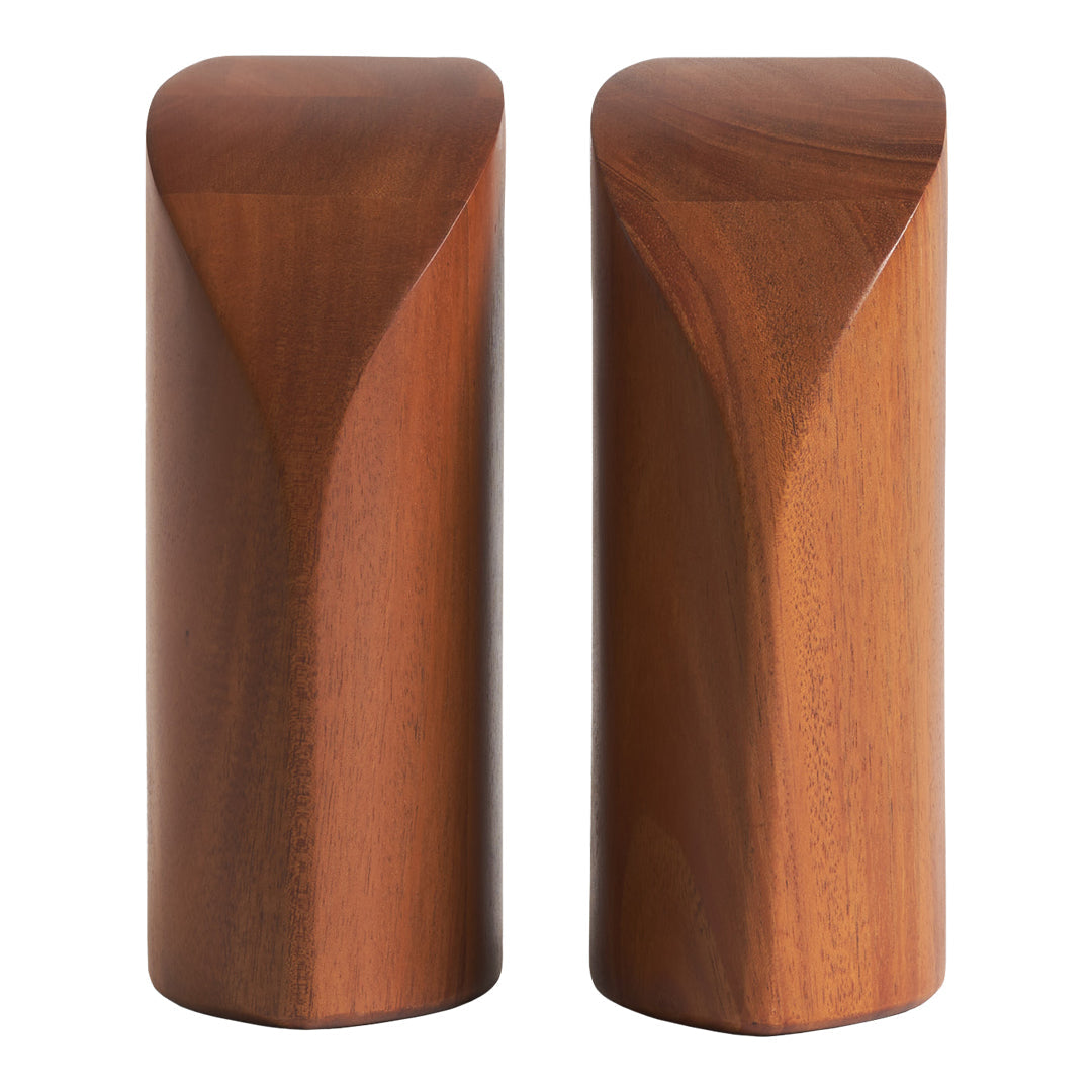 Sleek brown wooden salt and pepper shakers with smooth, curved edges and a minimalist design.