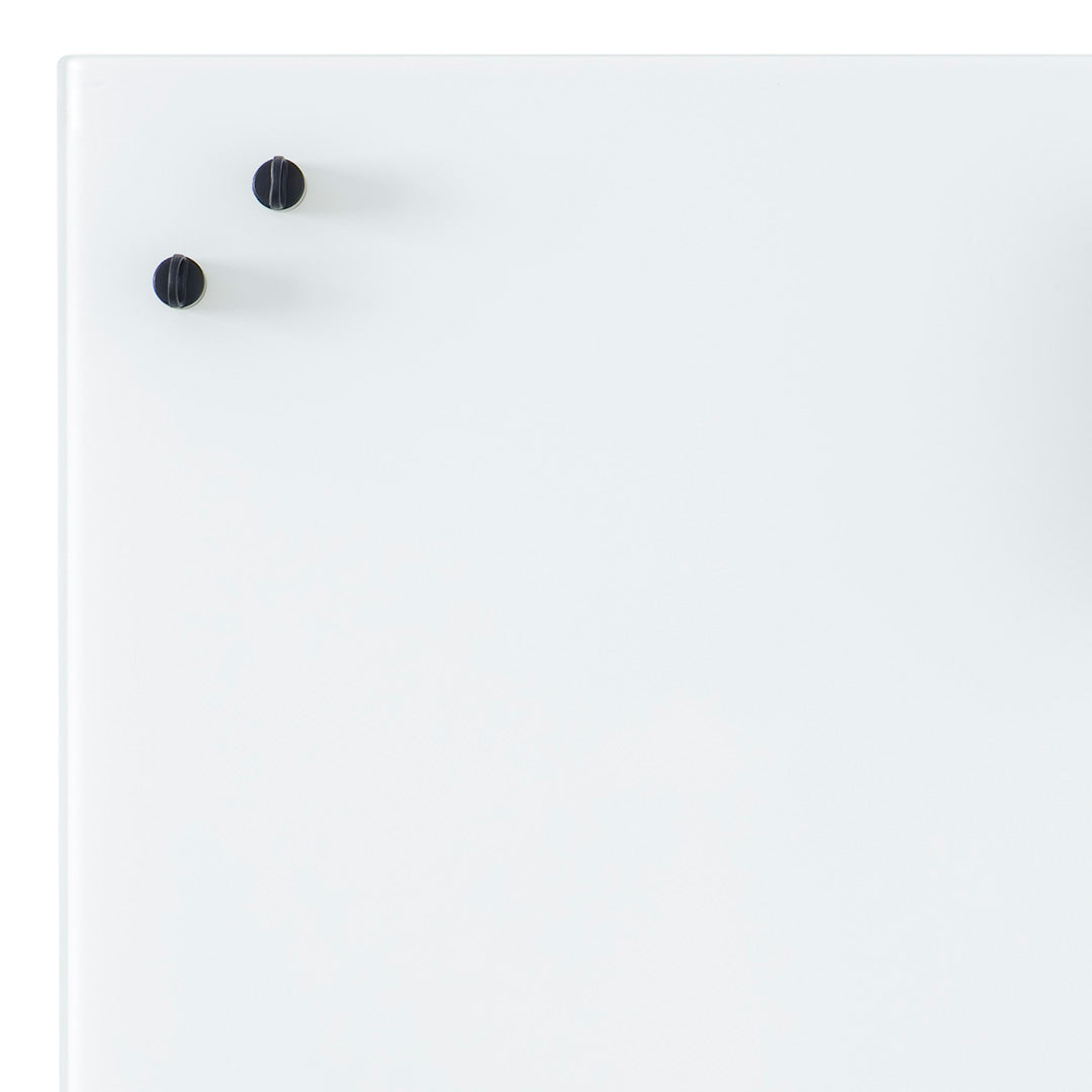 White background with two black knobs, showcasing a minimalist and modern design.