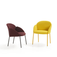 "Two modern chairs: one in rich burgundy, the other in vibrant yellow, featuring smooth, curved upholstery and sleek legs."