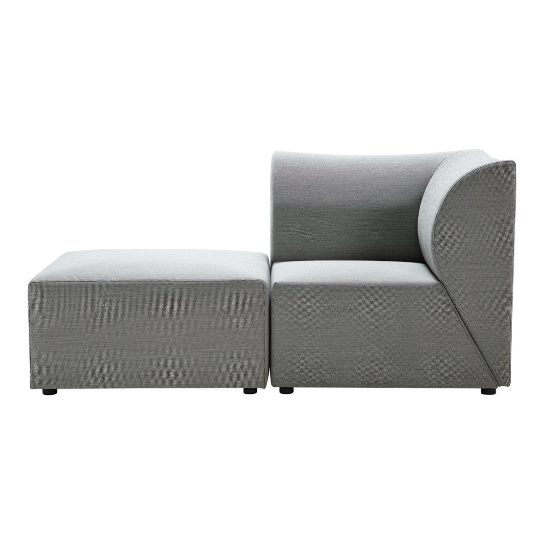 Modern gray sectional sofa with a sleek, minimalist design and textured fabric. Perfect for contemporary decor.